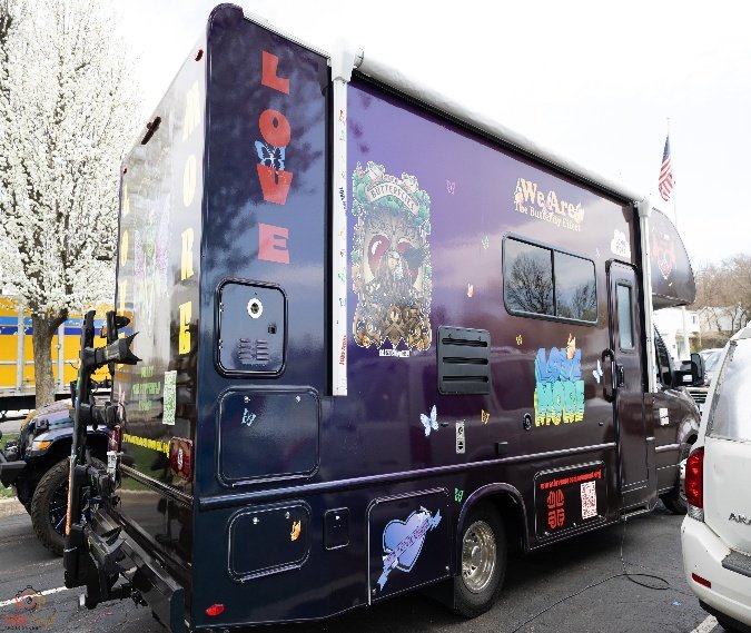 The LoveMobile, an RV painted with Love More artwork